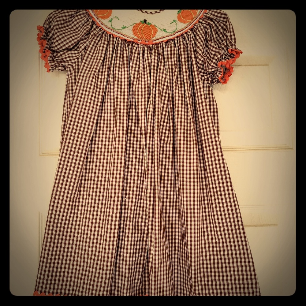 Bishop style smocked dress.
